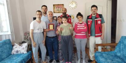Konya'da yarım asırlık ailenin örnek davranışı ödüllendirildi